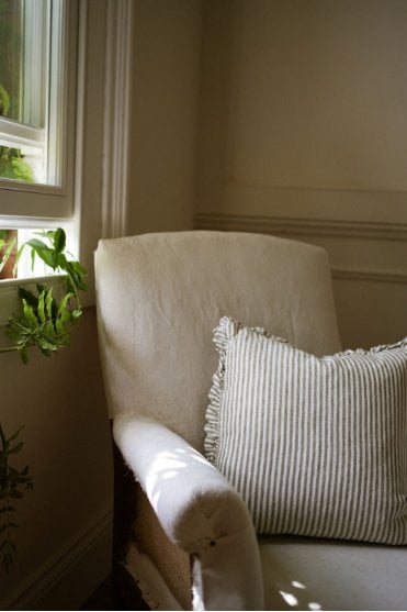 The Provence Ticking Stripe Cushion in Olive